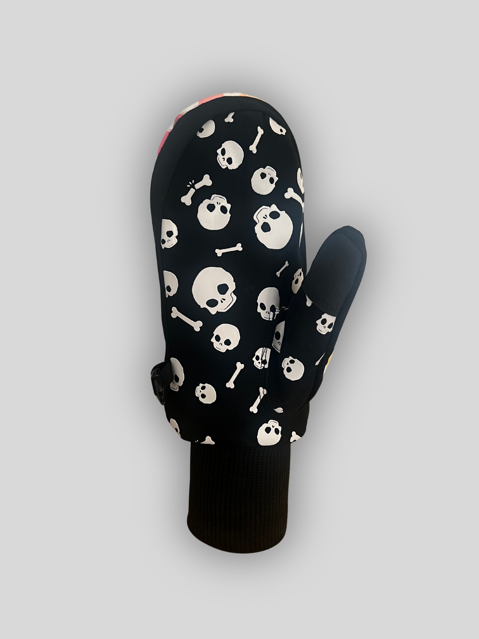 Shovel Snowsports Skull Mitts – ski and snowboard gloves with bold skull design on the front and silicone skull grip on the palm, shown on a grey background. This is the back view