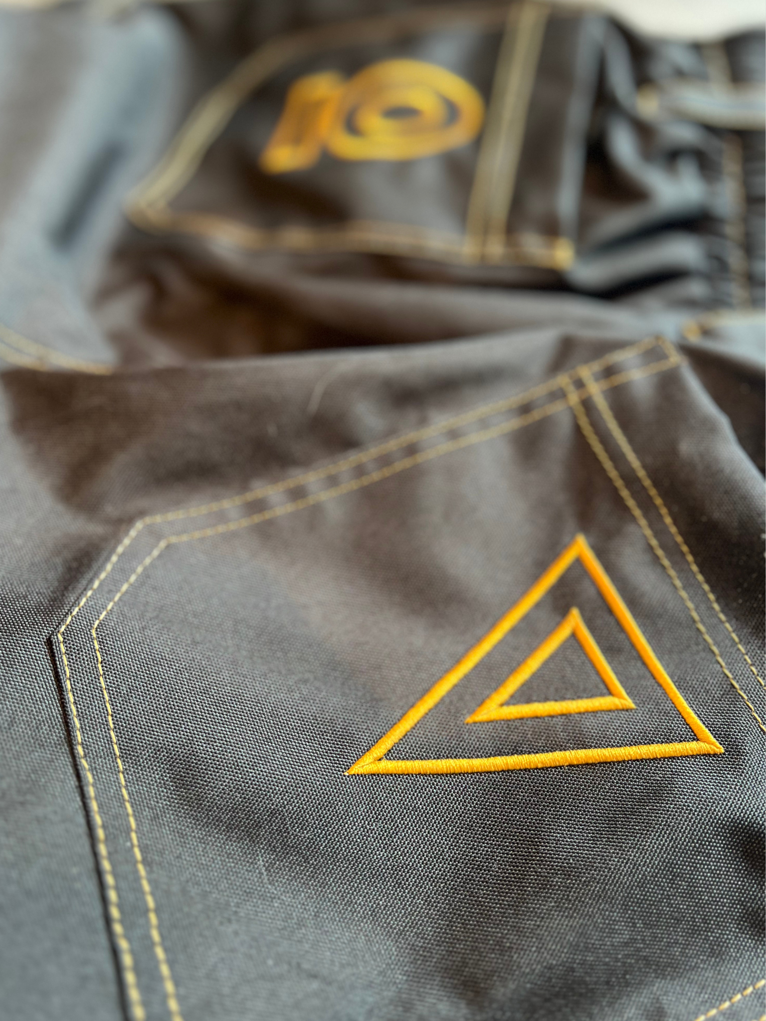 Close-up of back pockets, On The black jeans style Ski and Snowboard pants,