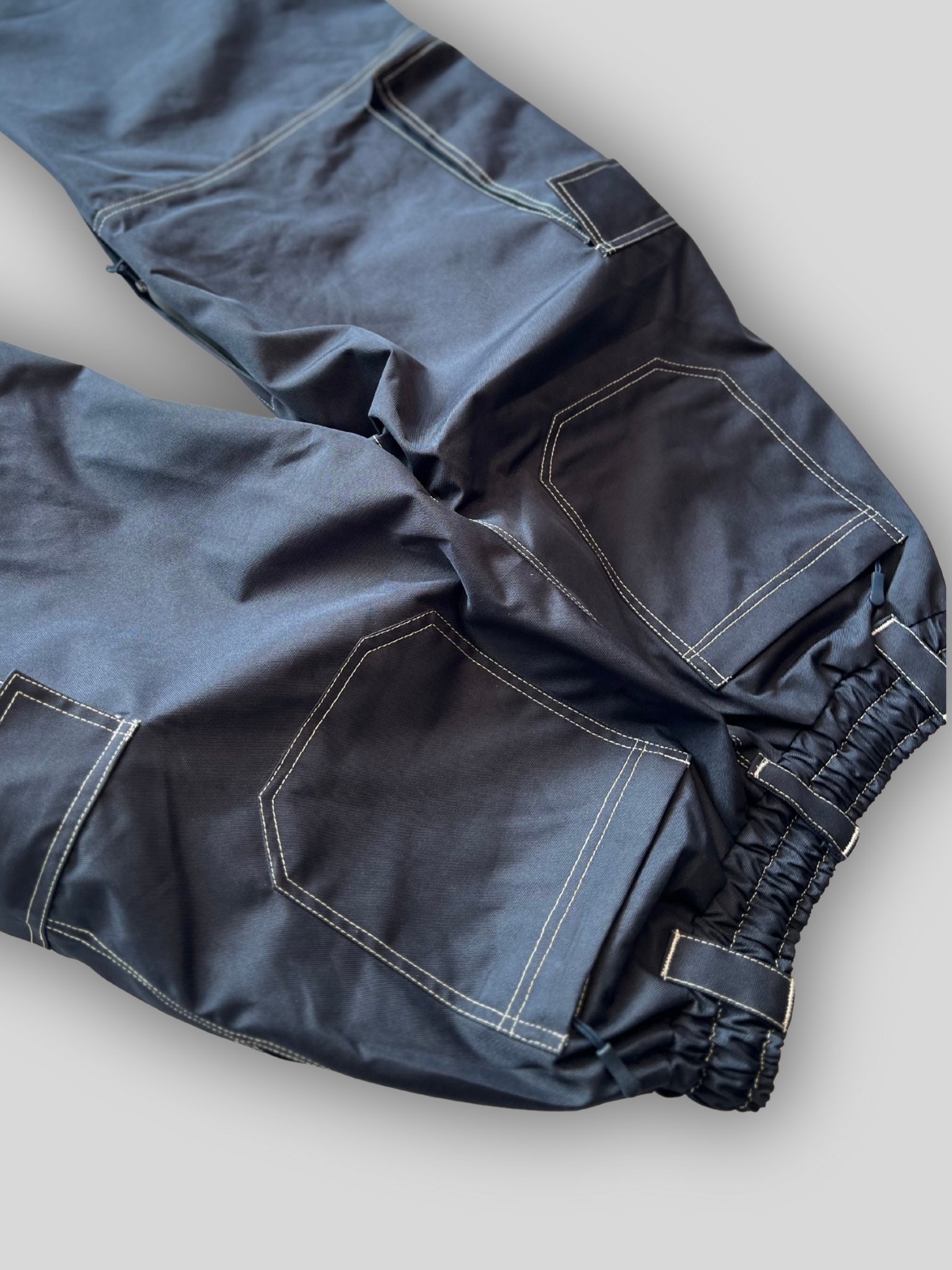 Back view of blue jeans style Ski and Snowboard pants.