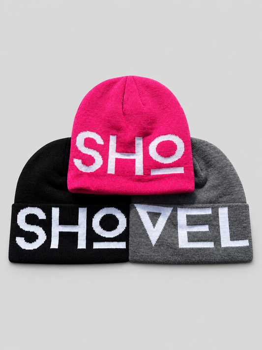 Pink, black and grey Shovel logo beanies on a light grey background