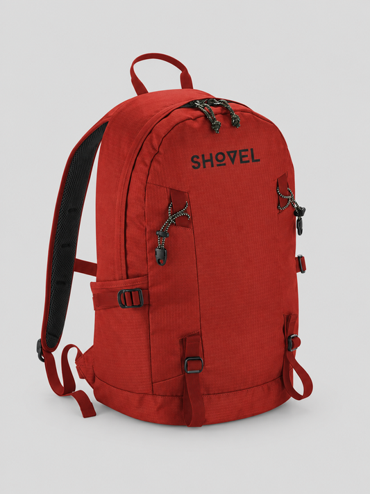 Red Shovel Riding Gear Bag on a light grey background
